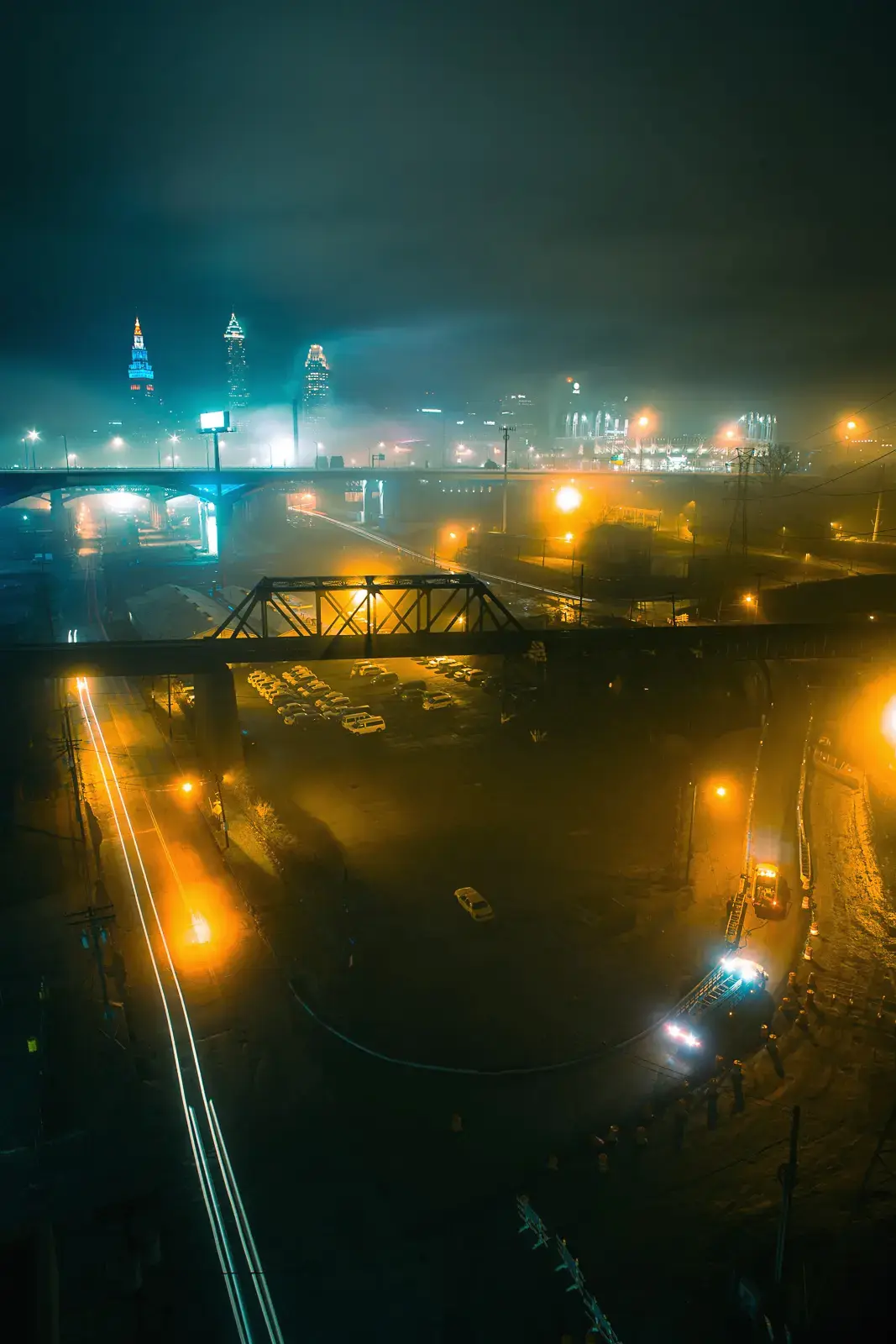 A foggy Cleveland skyline from the top of a lift bridge